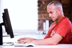 Man using a desktop computer