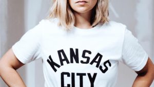 Women wearing tee shirt that says Kansas City