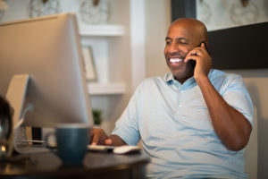 EasyVest Man Looking at Computer Screen